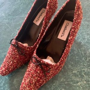 Ladies red variegated high heels with black bow and black 3” heels